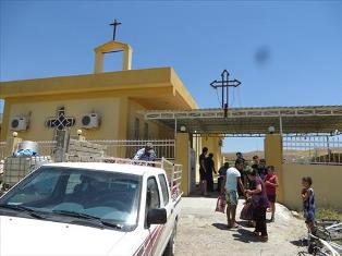 Relief arrives at a church in an Iraqi village 