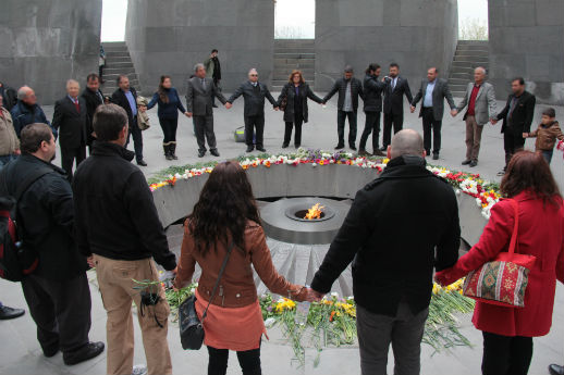 Turkish and Armenian Christians circle the Armenian Genocide Memorial in Yerevan, Armenia, on April 11. NOTE: faces have been blurred to protect identities.