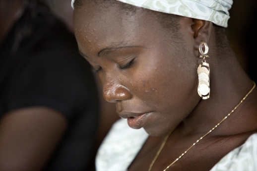 A Christian woman at a church service in Nigeria.