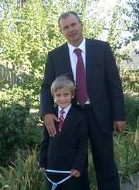 Ukrainian Pastor Edward Dolzhikiv with his son in Crimea. Summer 2013 
