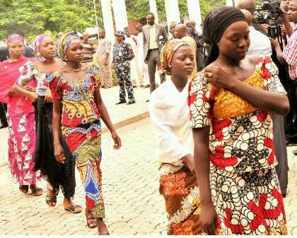 Chibok girls who managed to escape arriving at Nigeria's State House to meet with Nigerian President Jonathan. Abuja, Nigeria; July 22, 2014