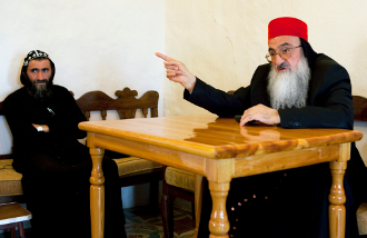 Metropolitan Samuel Aktas, right, at the Mor Gabriel Monastery. 'We are digging our own grave; this way they would be able to purge Syria of its Christian population.'