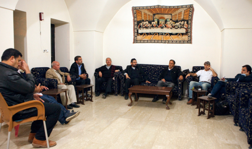 A meeting with local clreics at Mor Abrohom Monastery.