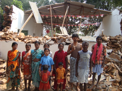 Members of Divya Jyoti Church were too late to stop a mob from knocking down their building.