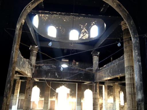 The charred remains of the Orthodox Church of the Virgin Mary in Delga.