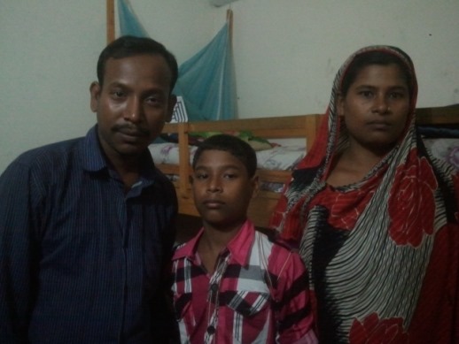 Mojnu Mia, 31, pictured with his wife and son, said that he was placed under a lot of pressure to recant his Christian faith.