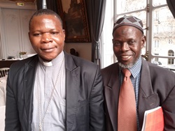 Mgr. Dieudonné Nzapalainga and Imam Omar Kobine Layama, pictured in Paris.