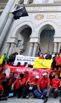 Protesters gather outside the Palace of Justice in Malaysia's administrative capital March 5 to denounce the Catholic Herald's appeal in Federal Court.