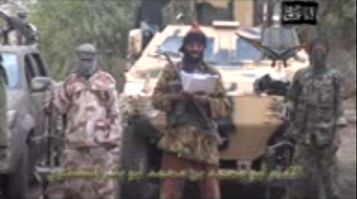 In this image captured from a 57-minute video released May 5, a man purported to be Boko Haram leader Abubakar Shekau says he will sell the girls kidnapped April 14 from school in Chibok village, in Borno state, Nigeria.