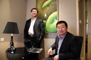 Chinese human rights lawyers Zhang Kai (left) and Jiang Tianyong (right).