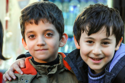 Schools should teach neutral lessons on religion, according to Turkey's constitution, but critics say they impose Sunni Muslim rituals Turkish boys in Istanbul, Nov 2012