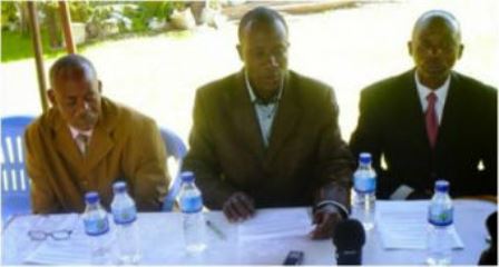 Pastor Crodward Edwar (centre) at a press conference about the Bukoba murder 