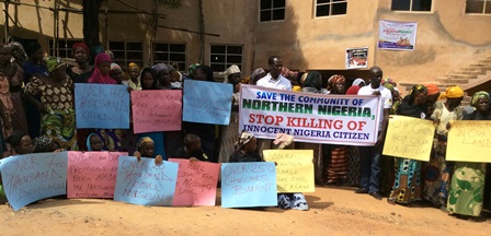 Displaced Christians expressed their anger at the headquarters of the Church of the Brethren, or EYN Church, in Jos. Nov. 17