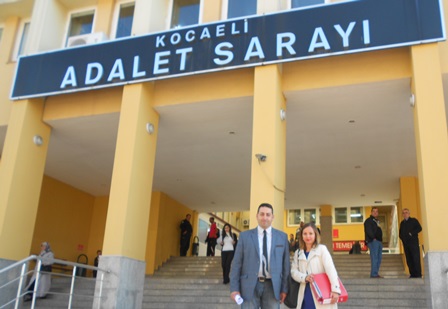 Pastor Emre Karaali of the Izmit Protestant Church on the steps of the Courthouse in Izmit with his lawyer after the 3rd hearing on Oct. 21, 2014