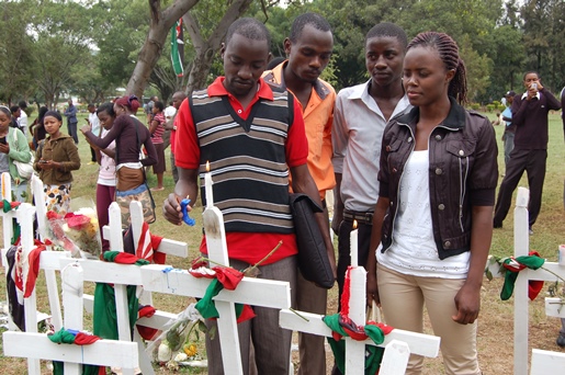 Kenyans light candles in memory of the 148 students who lost their lives in the April 2 attack.