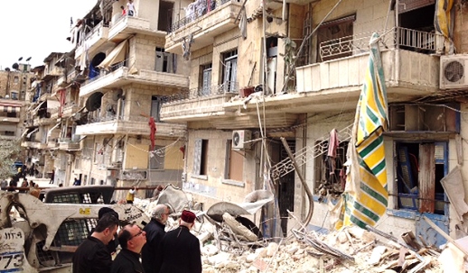 Archbishop Jean-Clement Jeanbart tours a damaged Christian sector in Aleppo, Syria.