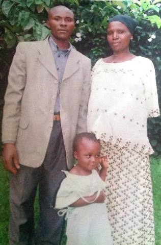 Kanyamanda Kambale, with his wife Odette, and one of their children.
