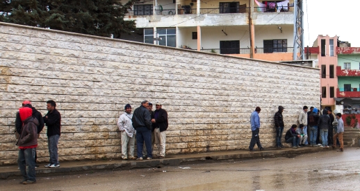 Syrian refugees in Lebanon looking for a day's work, March 2014.