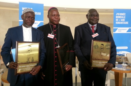 Left to right: Imam Oumar Kobine Layama, Msgr. Dieudonné Nzapalainga and Rev. Nicolas Guérékoyamé-Gbangou received the 2015 Sergio Vieira de Mello Prize at the UN office in Geneva, Switzerland on 19 Aug.