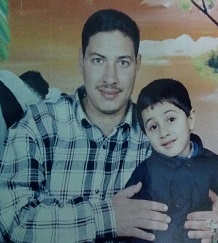 A picture of the young Bishoy with his now bereaved father.