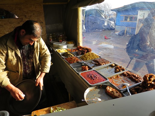 The Calais 'Jungle' has become almost like a town, with shops and places to eat.