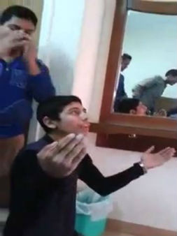 A still image
 taken from the video that landed the four students in trouble.
