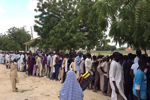 Internally displaced people queuing for relief materials in Maiduguri, Borno State. Oct. 2014