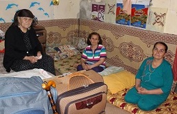 Bahija (right), her sister Samira and elderly mother Bahar share a one-bedroomed house in Jordan with another family of three, who sleep in the lounge.