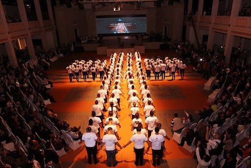 The event opened with around 100 young people forming the shape of a cross.