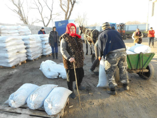 Food distribution to poor and elderly families in rural Moldova.