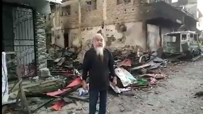 Catholic Priest Suganob is spending his 57th birthday in captivity, held by the Maute terrorist group in Marawi, Philippines. (Photo: still from a video released by the kidnappers)