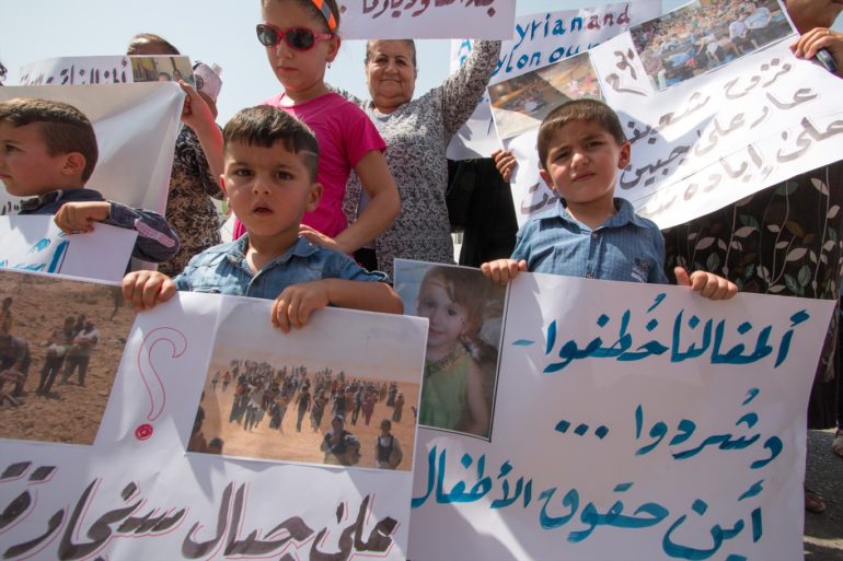 Iraqi women and children are demonstrating in front of the UN office in Erbil where they present a declaration to the UN calling for protection of minority groups on 13 August 2015. (Photo: Open Doors International)