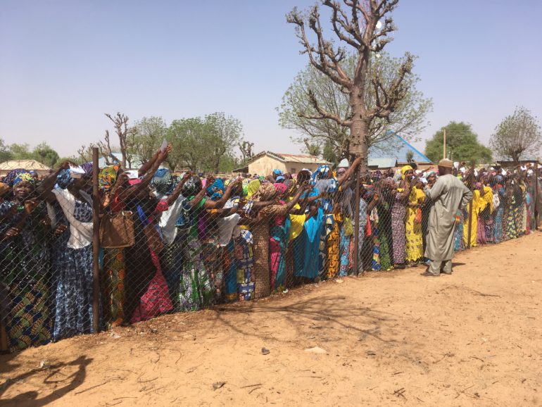 Thousands of Nigerians queued at several food distribution locations to receive a food parcel that will help them to get though the lean season. (Photo: Open Doors International)