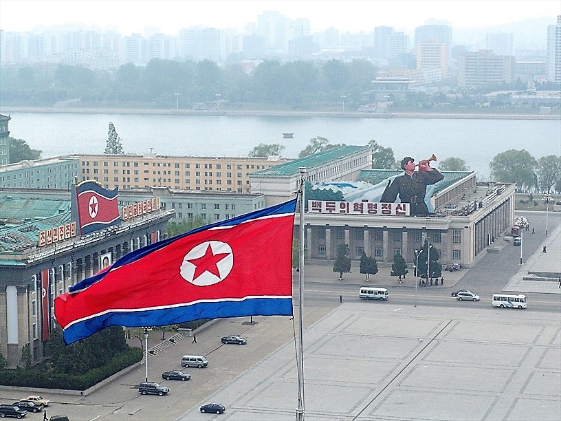 North Korean flag flying over Kim Il Sung square in the capital, Pyongyang.