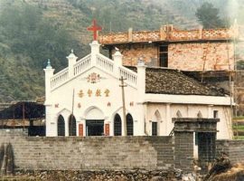 A church building in Wenzhou carrying a cross on top. Churches in Zeijang province have been under pressure to remove their crosses in recent years.