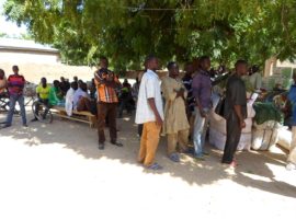 Refugees and IDPs, uprooted by Boko Haram related violence in Northeastern Nigeria and Far North Cameroon, are waiting for relief aid to be distributed. (Photo: World Watch Monitor)