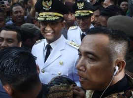 New Governor of Jakarta, Anies Baswedan and his running mate, the new Vice Governor of Jakarta, Sandiaga Salahudin Uno arrived at Jakarta City Hal for the inauguration ceremony on 16 October 2017. (Photo: Getty Images)