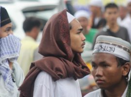 Young men joining the protest march against Jakarta's former Governor Ahok in December 2016. (Photo: World Watch Monitor)