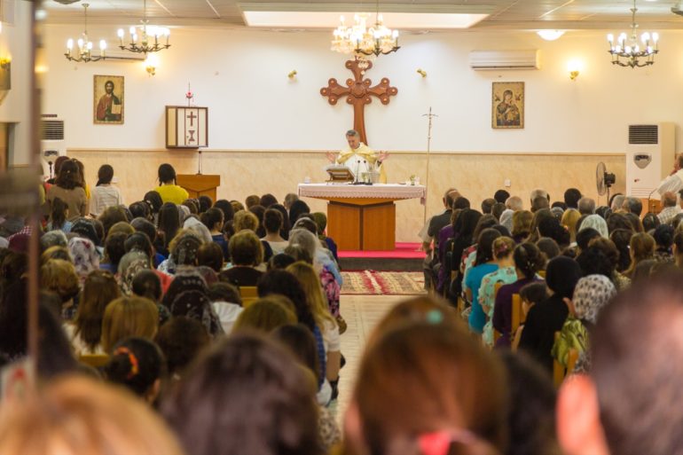 Evening mass at Mar Elia Chaldean Catholic Church in the Iraqi city of Erbil attended by many refugees from Mosul and Nineveh Plains who fled IS. (Photo: World Watch Monitor, 2014)