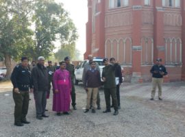 Bishop of Multan Leo Paul with a security inspection team outside Multan Cathedral, late Dec 2017