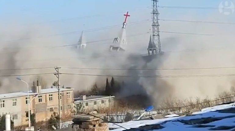 Explosives are set off in the Golden Lampstand Church in Linfen, Shanxi province, in a still taken from a video.