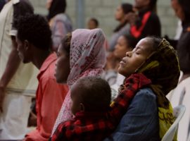 Christians worship during a church service in a town in central  Ethiopia. (Photo: World Watch Monitor, 2016)