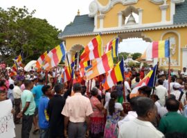 Buddhist flags are waved during a mass demonstration against Christianity in Sri Lanka, April 2017. (Photo: World Watch Monitor)