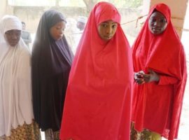 (From left) Zahra Bukar, 13, Fatima Abdu, 14, Fatima Abdulkarim, 15 and Yagana Mustapha, 15, were released by Boko Haram after they were abducted from their school in Dapchi, in February 2018. (Photo: AMINU ABUBAKAR/AFP/Getty Images)