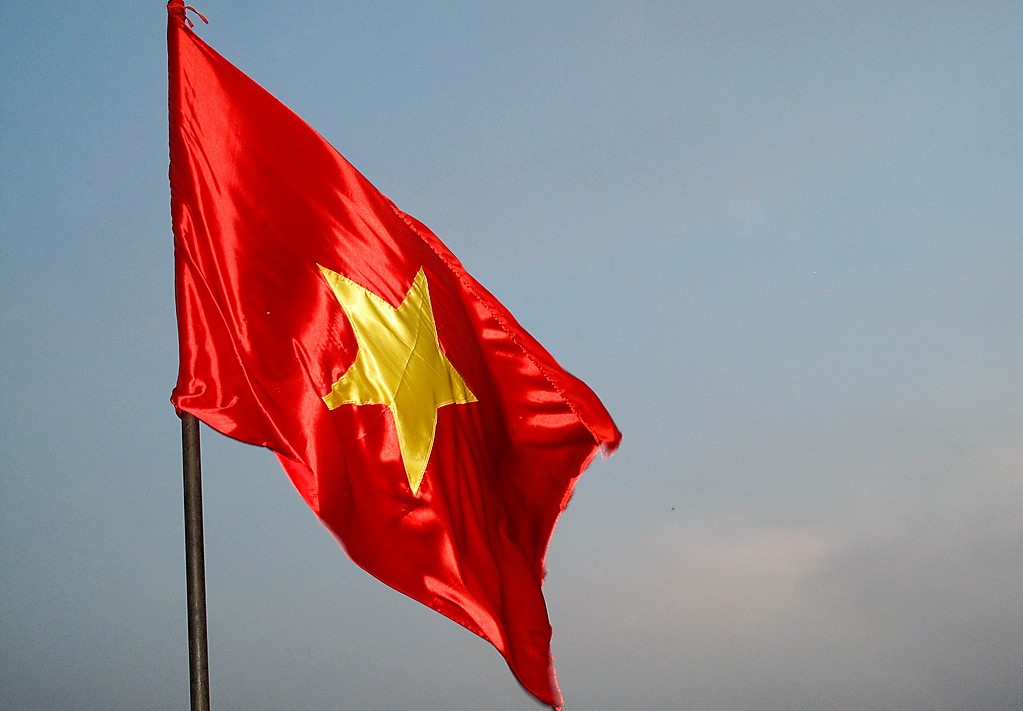 Vietnam's flag flying over capital city, Hanoi (CC/Flickr/Nir Sinay)