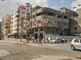 A street in Gaza city showing flags of different Palestinian political groups and factions. (Photo: World Watch Monitor)