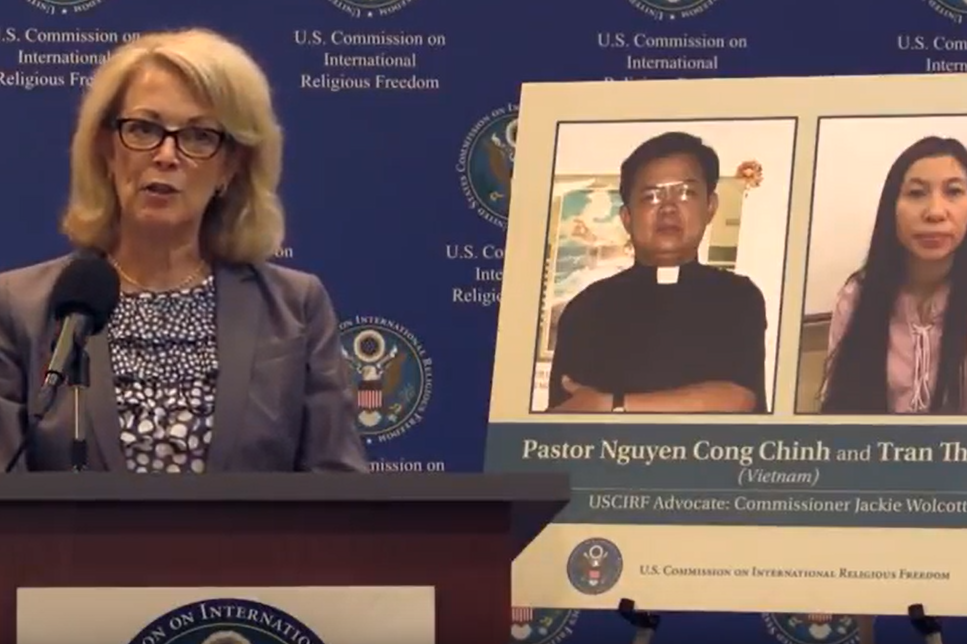 USCIRF commissioner Jackie Wolcott campaigning in 2017 for the release of Pastor Nguyen Cong Chinh, pictured with his wife Tran Thi Hong (YouTube/USCIRF)