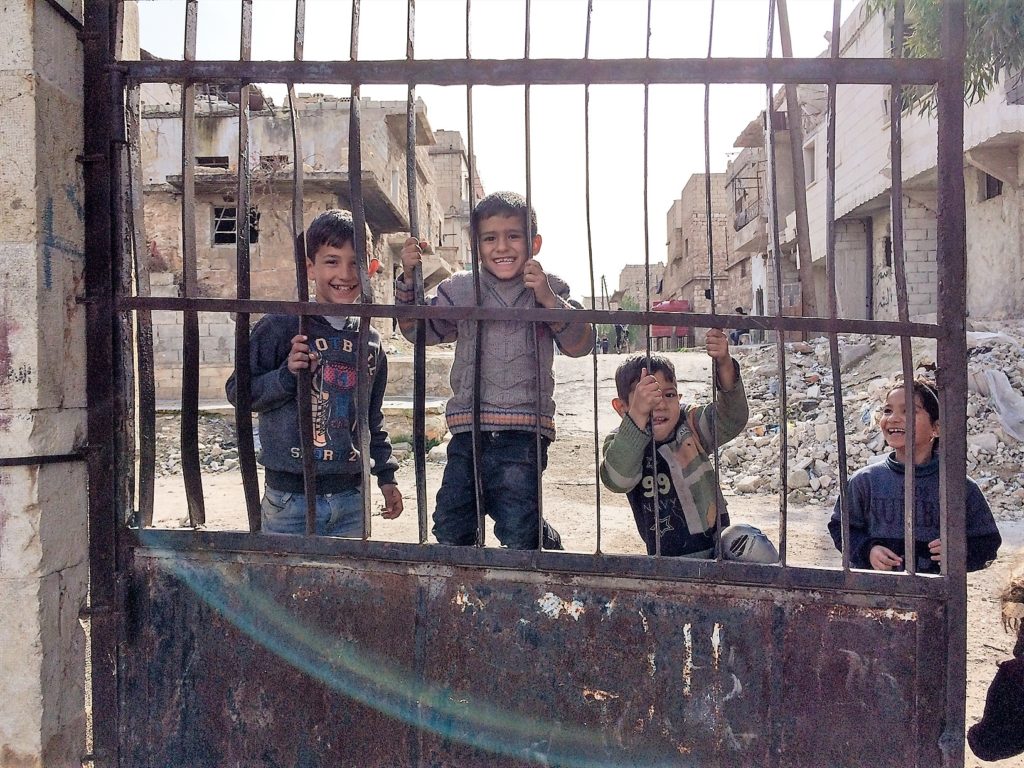 Children playing in Beit Sakhour, a neighbourhood in East Aleppo largely destroyed in Syria's ongoing conflict (World Watch Monitor)