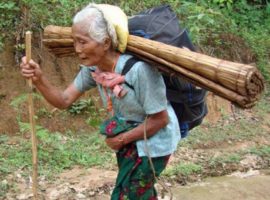 An elderly Kachin woman looks for shelter after fleeing fighting between Myanmar's army and Kachin rebels in December 2011. (Photo: World Watch  Monitor)