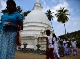 Buddhists visiting a temple in Sri Lanka. (Photo: World Watch Monitor)